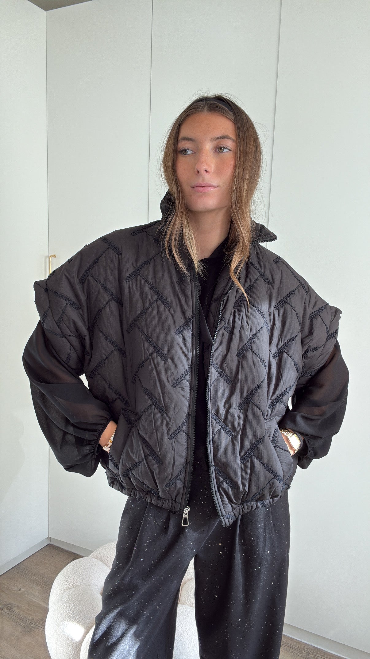 DOUDOUNE SANS MANCHE A MOTIF