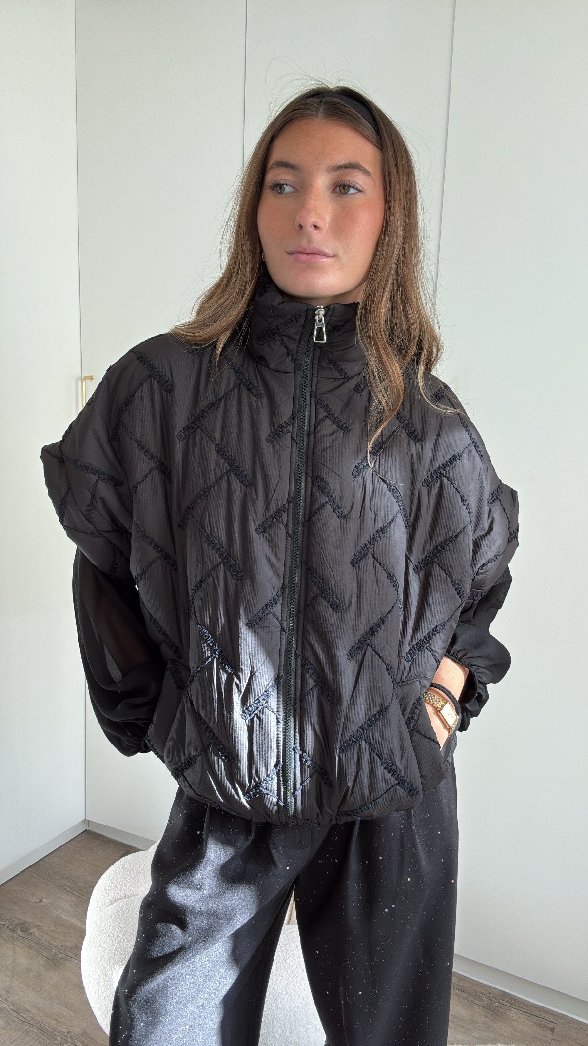 DOUDOUNE SANS MANCHE A MOTIF