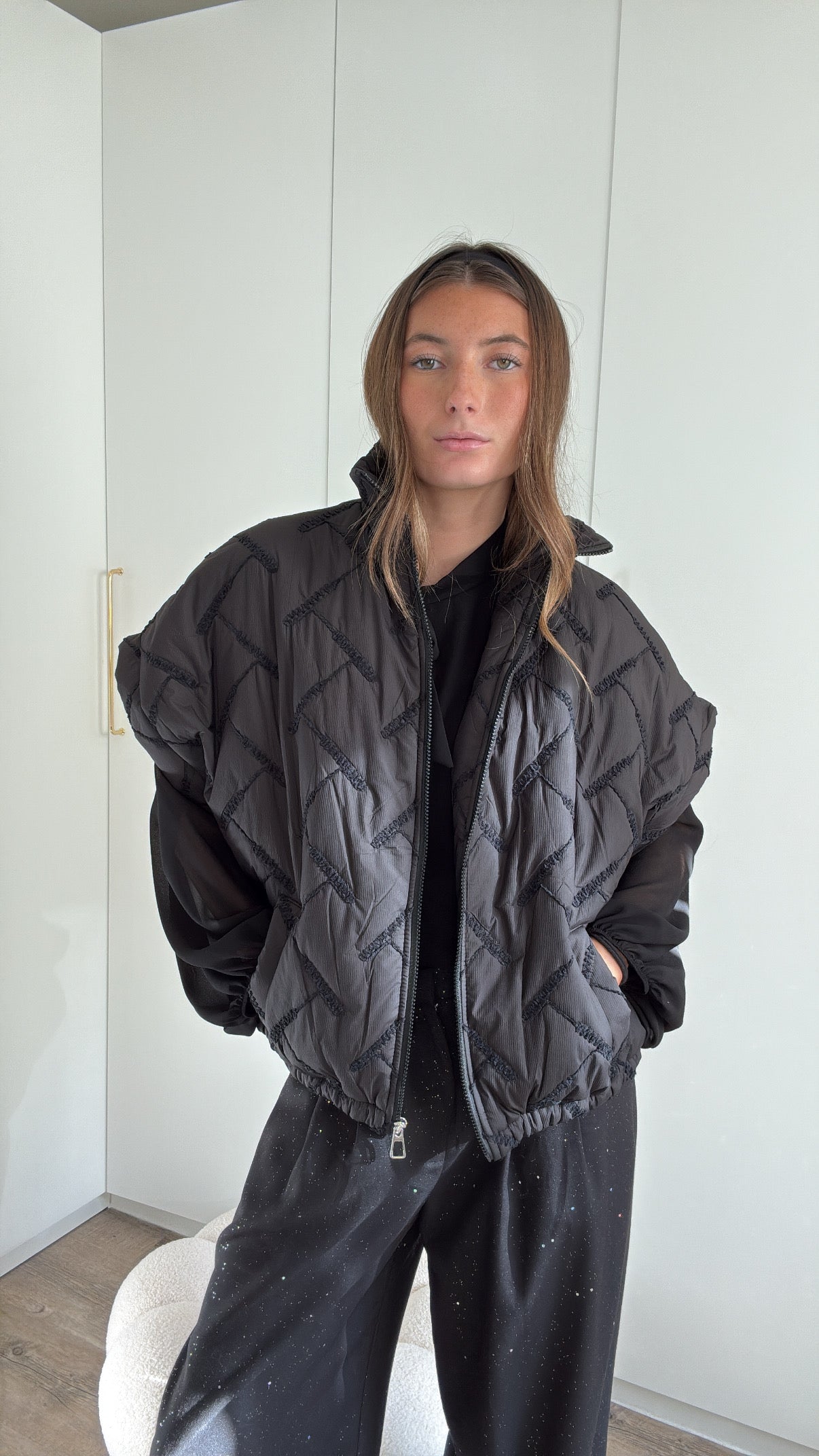 DOUDOUNE SANS MANCHE A MOTIF